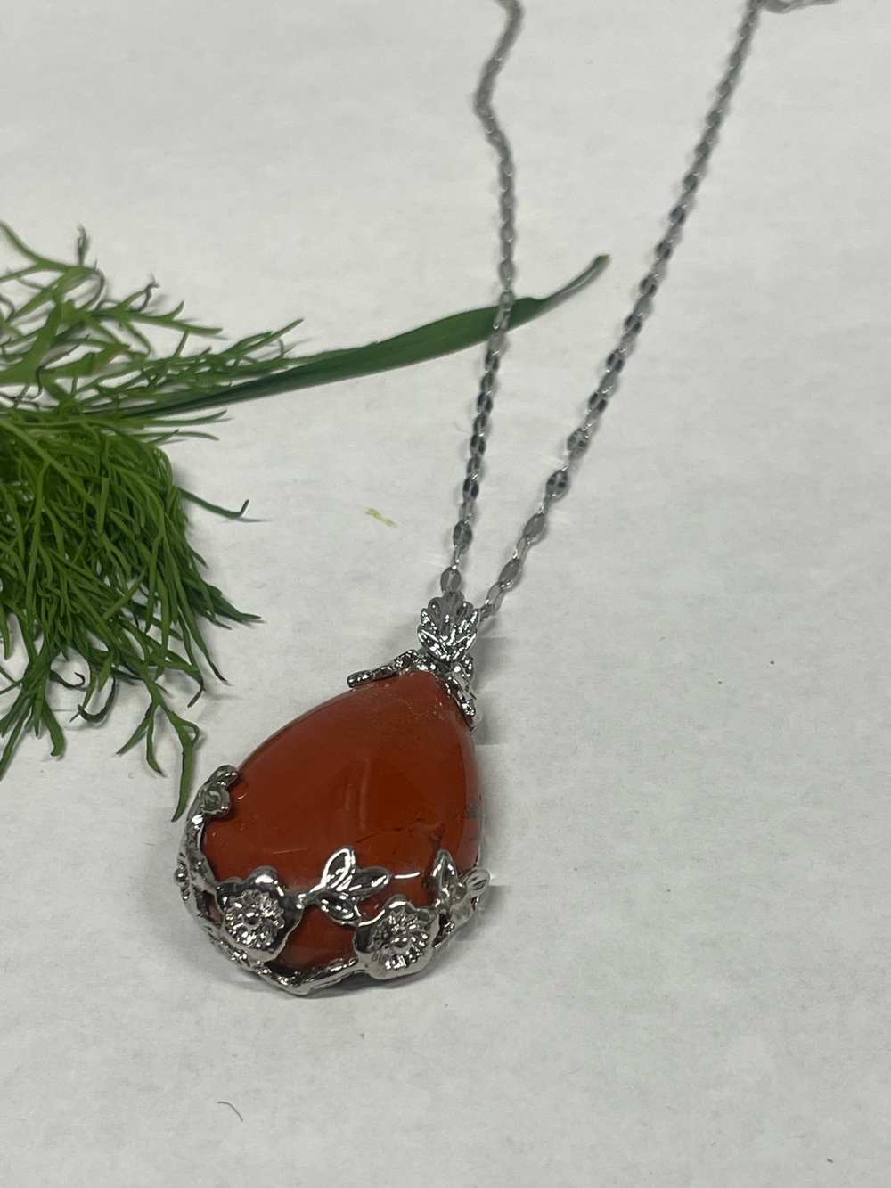 Silver Floral Teardrop Necklace with Orange Gemstone